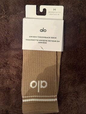 ALO Yoga Unisex Throwback Sock in tan with white logo